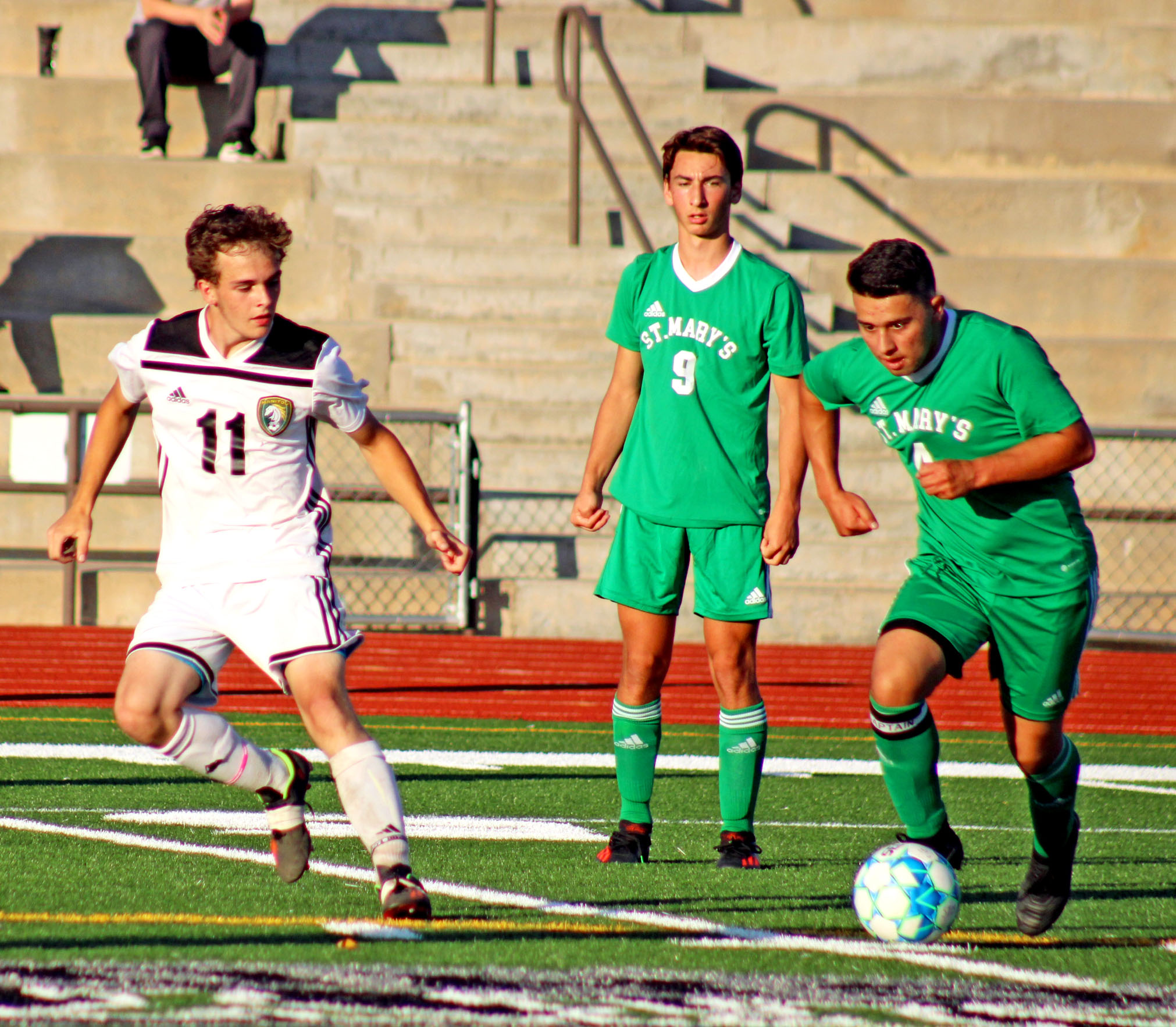 Photo by Daniel Mohrmann. Josh Patterson defends a St. Mary’s attack during the first half of Manitou’s 2-0 win over the Pirates on Sept. 1.