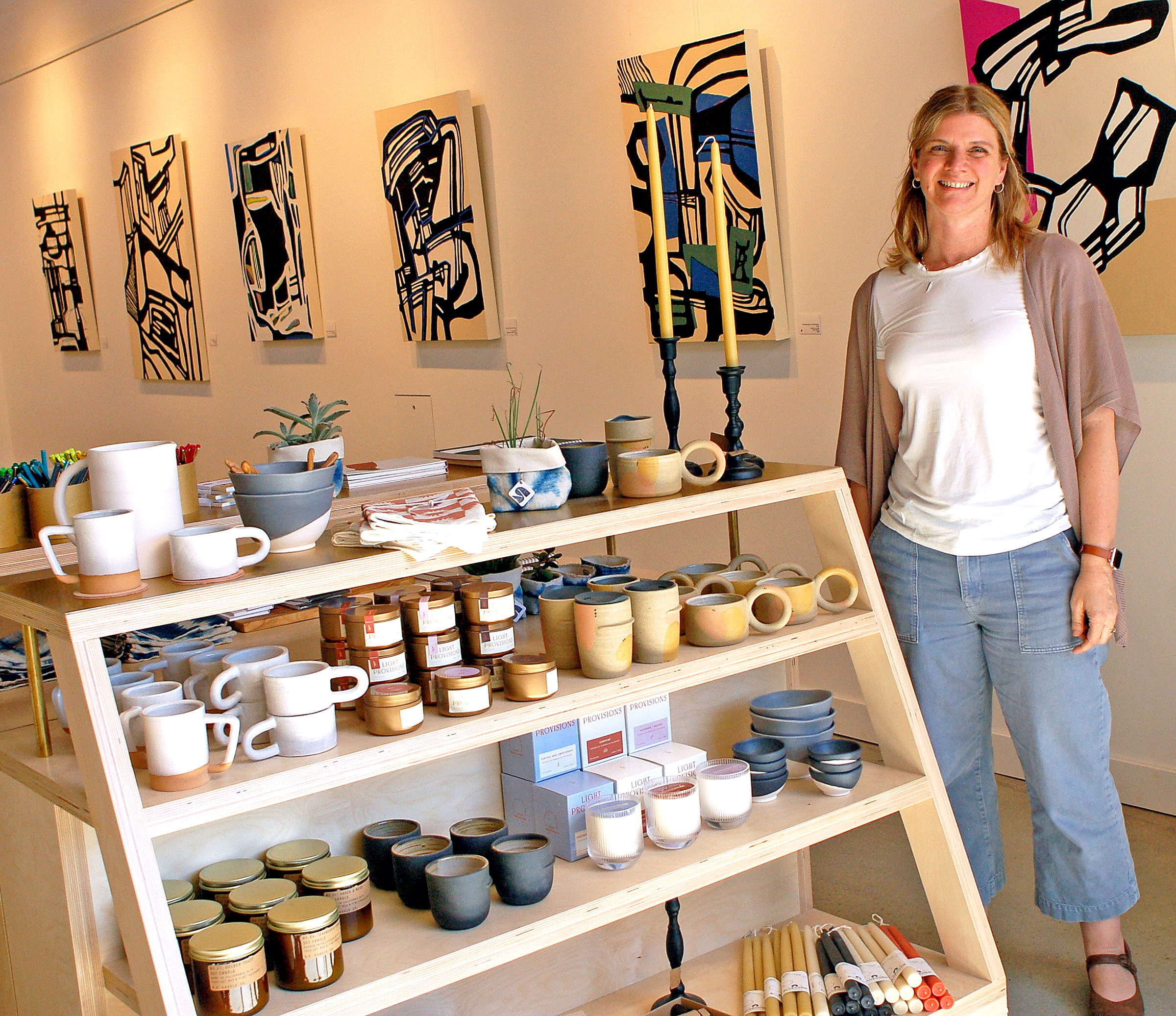 Photo by Larry Ferguson. Valerie Lloyd, owner of Surface Gallery, opened the business in Old Colorado City this summer.