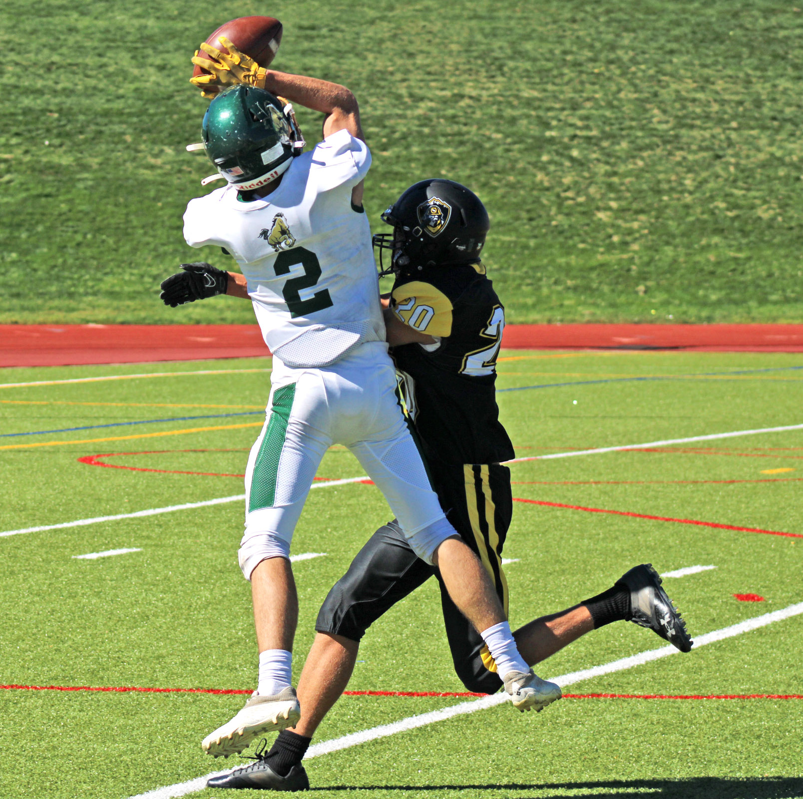 Photo by Daniel Mohrmann. Manitou Springs receiver Evan Scherr hauls in a catch in the first quarter of the Mustangs’ win over Prospect Ridge Academy.