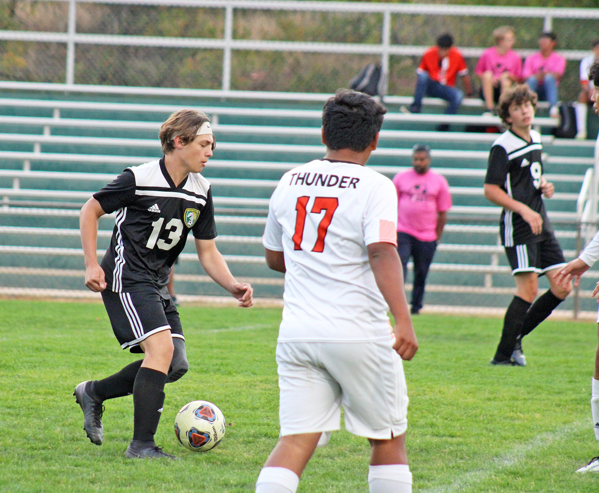 Photo by Daniel Mohrmann. Bowman Hall controls the ball during Manitou’s 2-1 win over Lamar on Oct. 11. Hall scored the game winner 33 seconds into overtime.