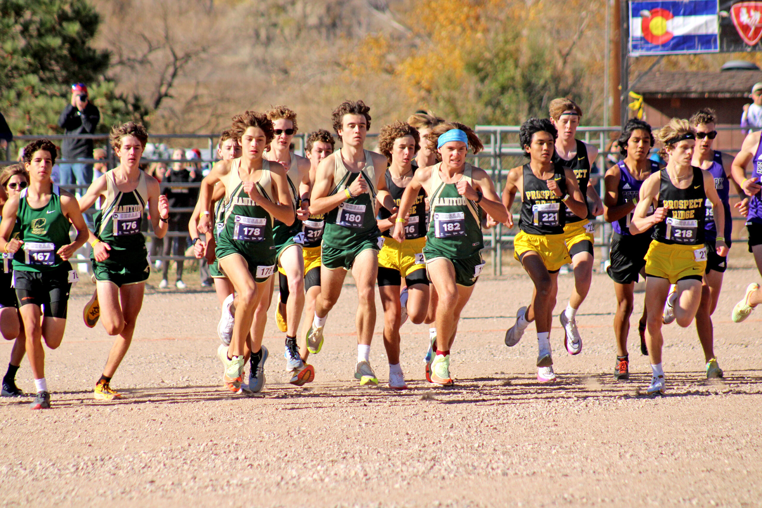 The Manitou Springs cross-country team takes off from the start line of the 3A state race. The Mustangs will return their top five runners next season.