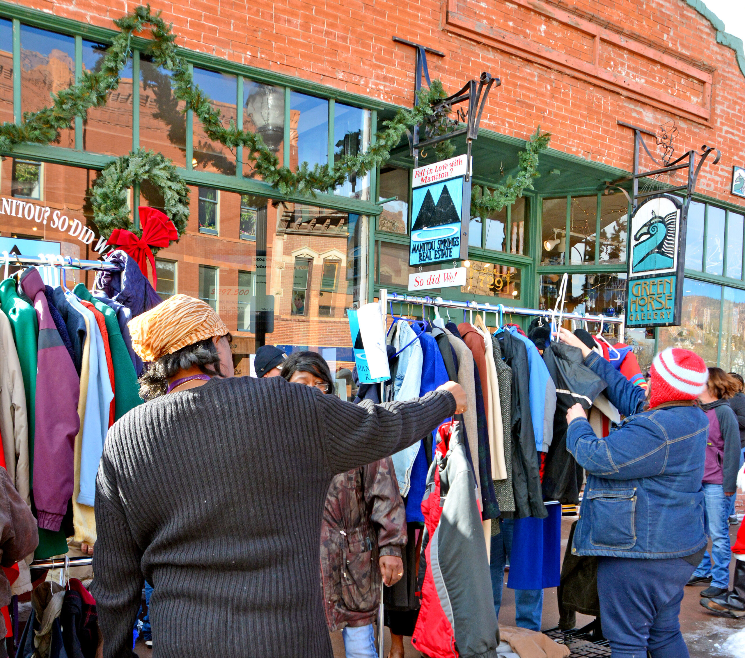 People look through clothing during a previous giveaway. Bulletin file photo