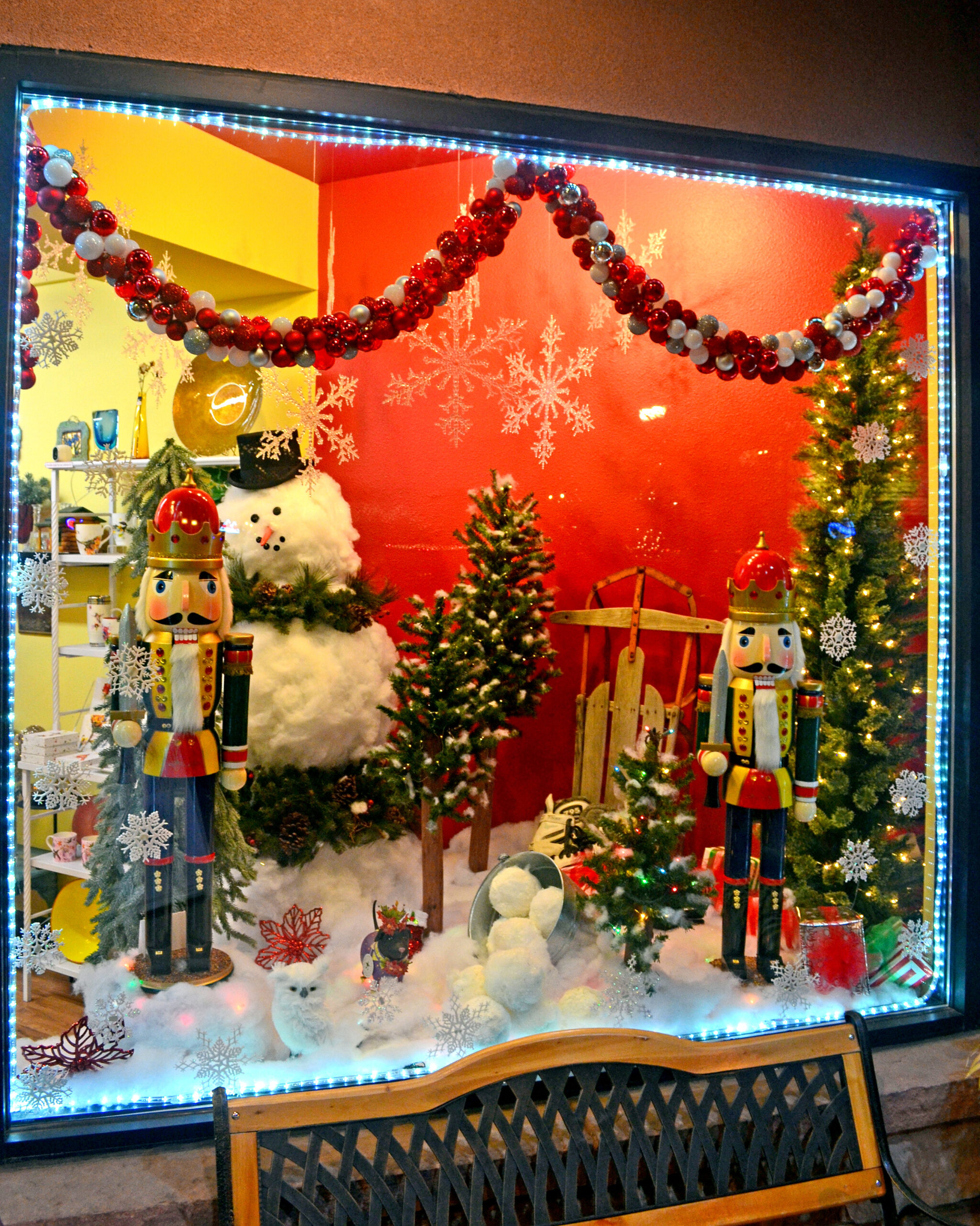 Bulletin file photo. A downtown storefront was festively decorated in December 2018.