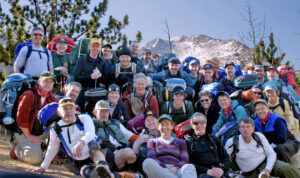 Courtesy photo. AdAmAn members relax in front of Pikes Peak before a previous year’s climb.