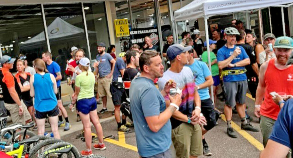 Courtesy photo. Outdoor sports enthusiasts gather outside Routes Outfitter, 3131 W. Colorado Ave.