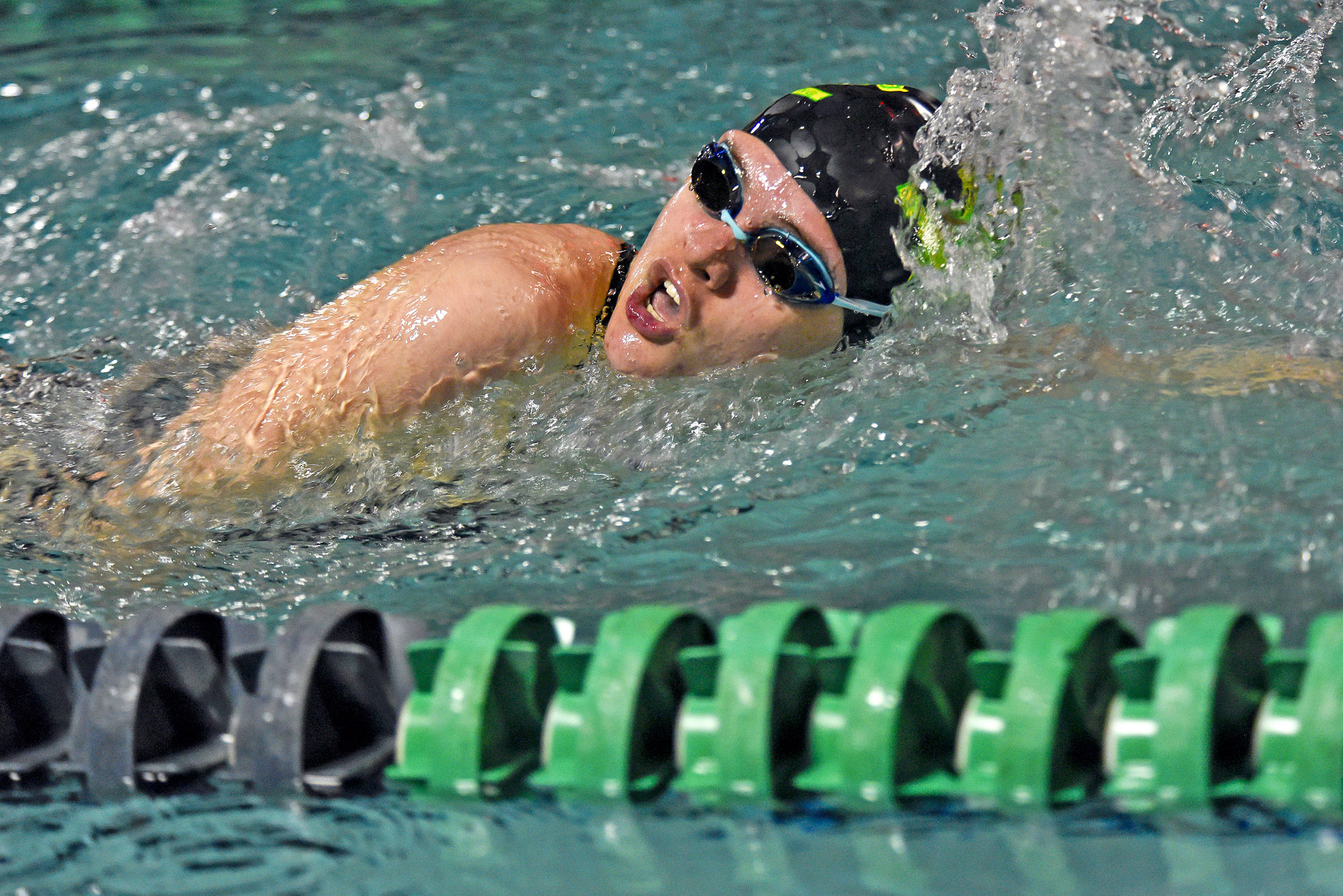 Photo by Bryan Oller. Theron Heim competes during the Mustangs’ dual with Pueblo County.