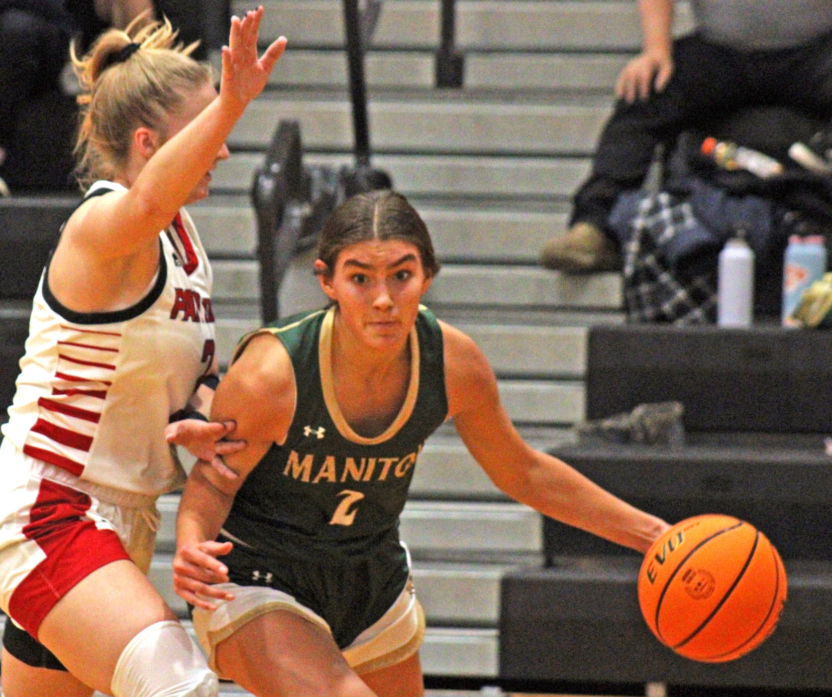 Photo by Daniel Mohrmann. Manitou Springs guard Grace Allen attacks the basket during the Mustangs’ loss to Peyton on Nov. 30. Allen became the Manitou single-game record holder in steals, swiping 15, in a loss to Alamosa last weekend.