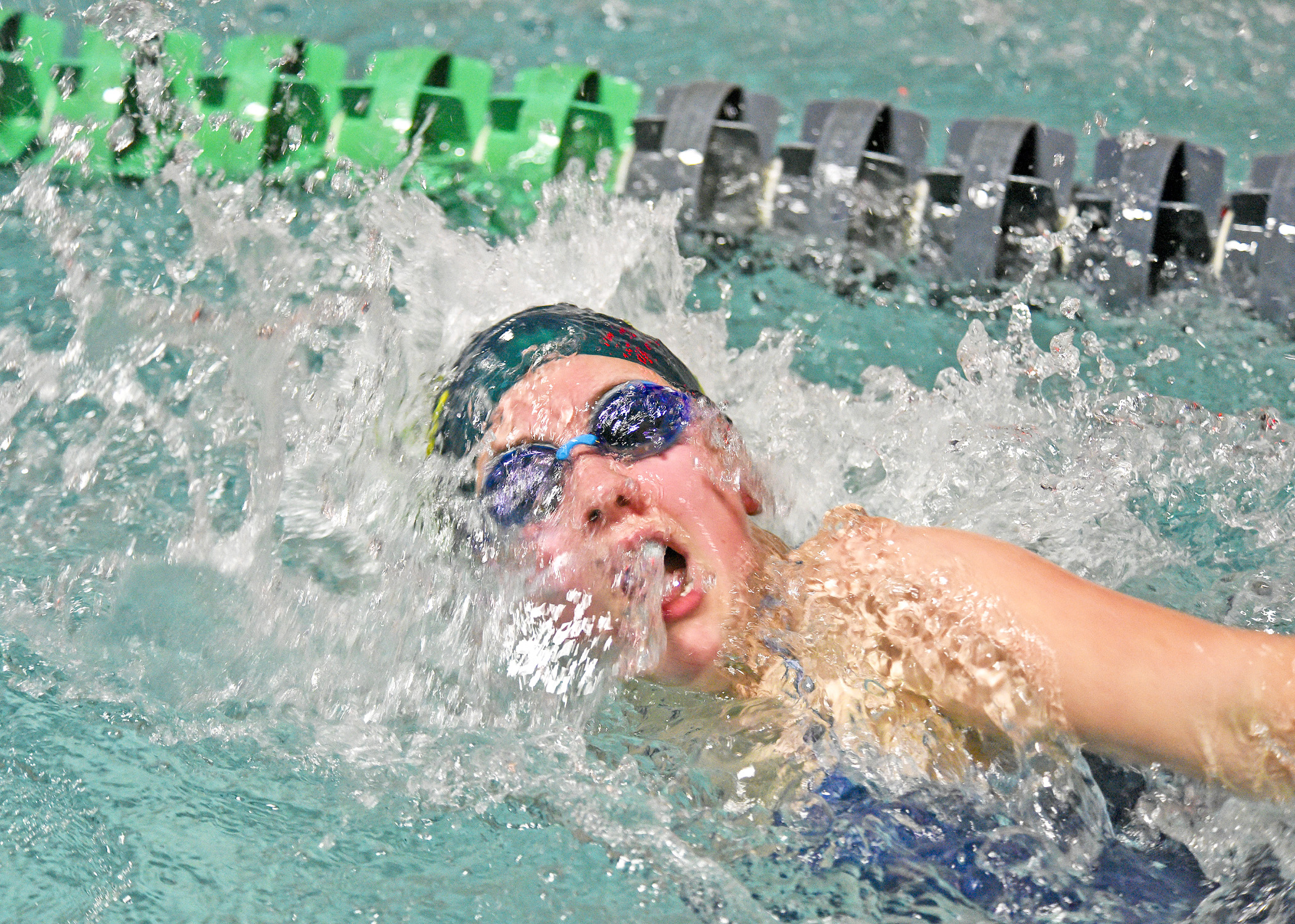 Photo by Bryan Oller. Sierra Tanner competes during the Dec. 2 meet against Pueblo County.